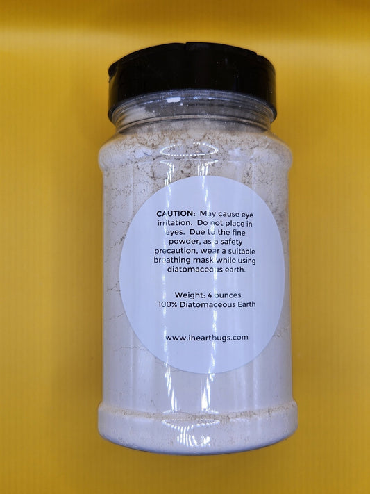 I Heart Bugs Diatomaceous Earth Mite/Bug Barrier comes in a clear plastic jar with a black lid, containing 4 oz of fine white powder. The label advises mask use for dust and warns of eye irritation. It’s 100% diatomaceous earth. Website on label.